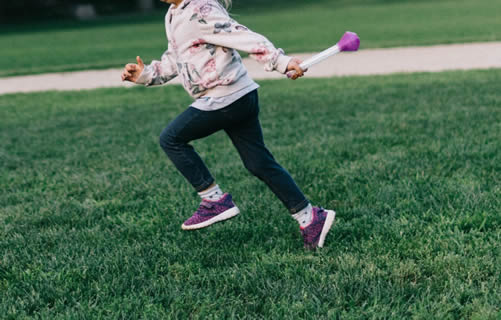 child getting excercise at the park