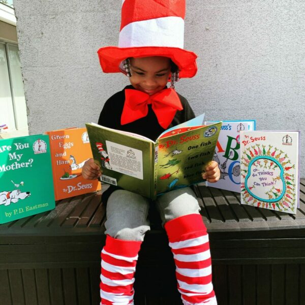 young boy reading a book