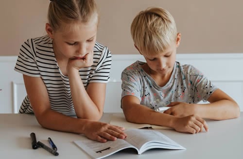 boy and girl reading