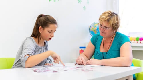 tutor breaking down tasks with a student