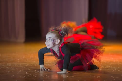 dyslexic child dancing and being creative