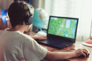 child playing a video game on computer