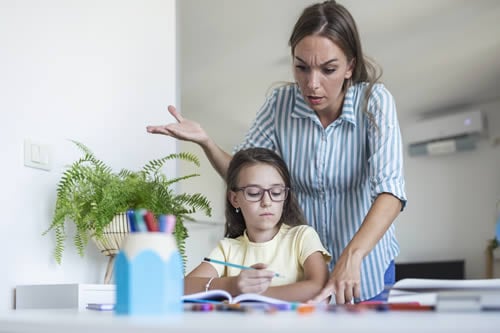 frustrated parent with dyslexic daughter