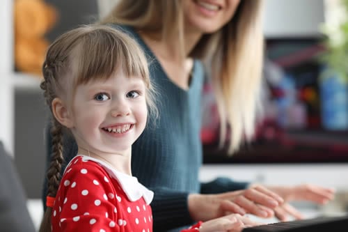 happy child with tutor