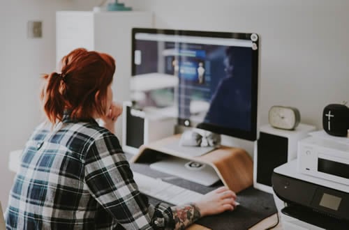 student learning at home on their desktop