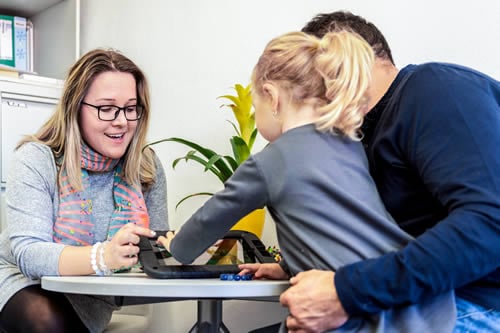 occuaptional therapist working with family