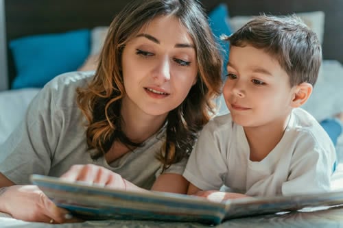 parent and child reading together