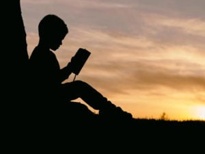 boy reading a book