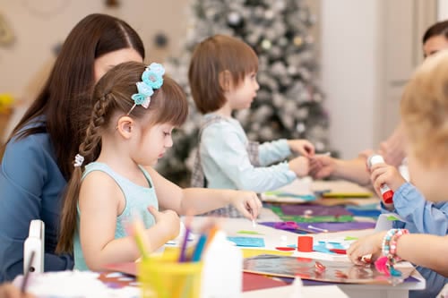 child learning new things in the classroom