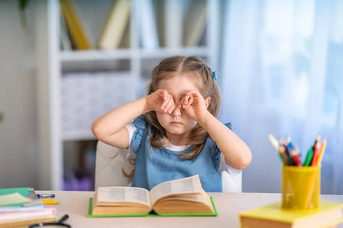 child getting tired whilst reading