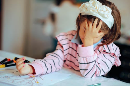 child overwhelmed at school cause of trauma