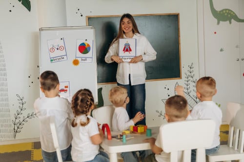 teacher getting to know SEND children on first day of term