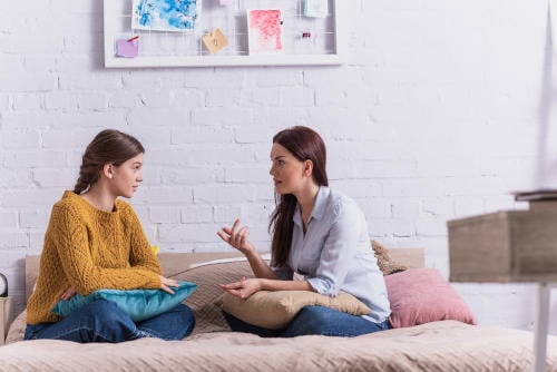 mother talking to child to continue communication