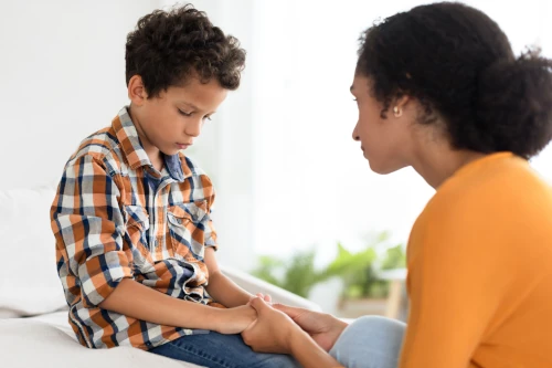 unhappy child with parent